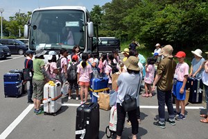 写真：8月7日国際交流から帰国